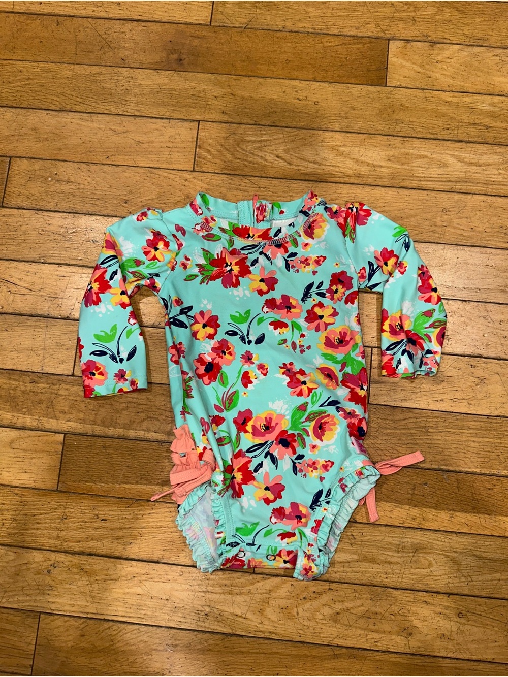 Baby Girl’s Ruffle Butts onesie swim bathing suit floral long sleeve rash guard